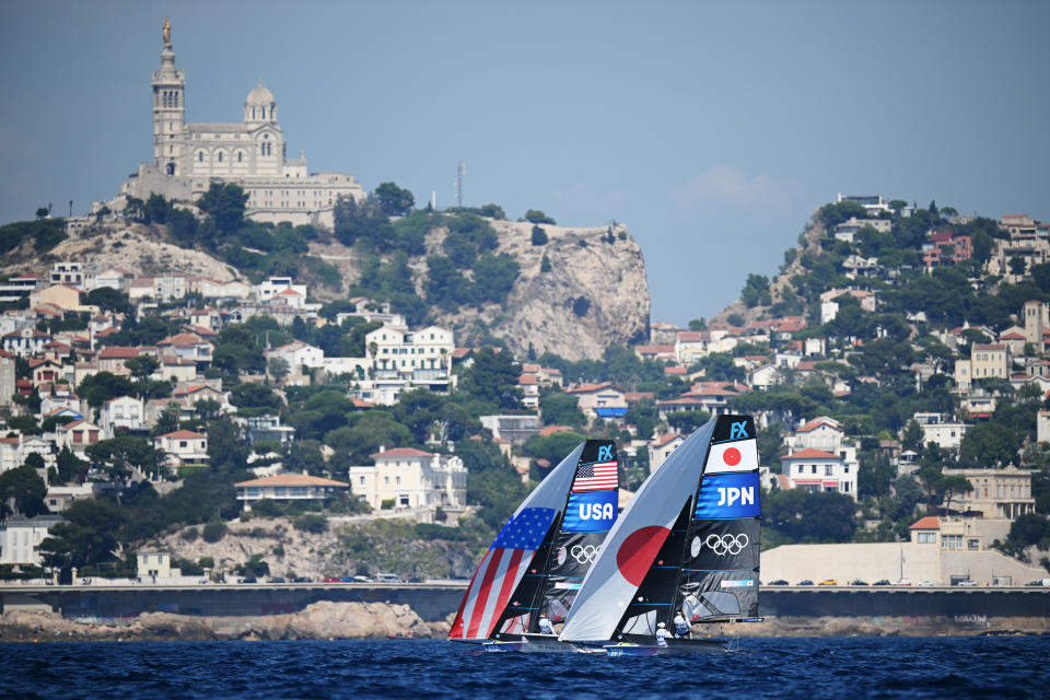 Stephanie Roble and Maggie Shea of of Team USA and Misaki Tanaka and Sera Nagamatsu of Japan compete in the women's skiff at the Paris Olympics. (Clive Mason/Getty Images)