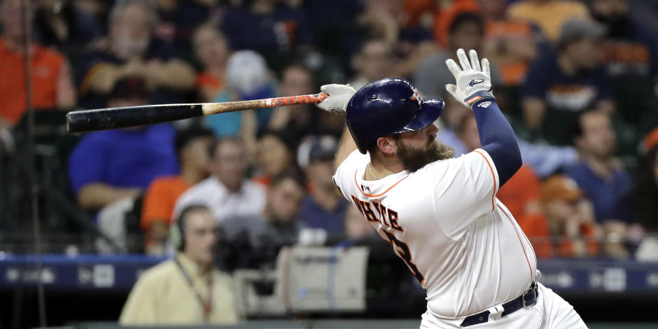 Houston Astros' Tyler White watches his two-run home run against the Colorado Rockies during the seventh inning of a baseball game Wednesday, Aug. 15, 2018, in Houston. (AP Photo/David J. Phillip)