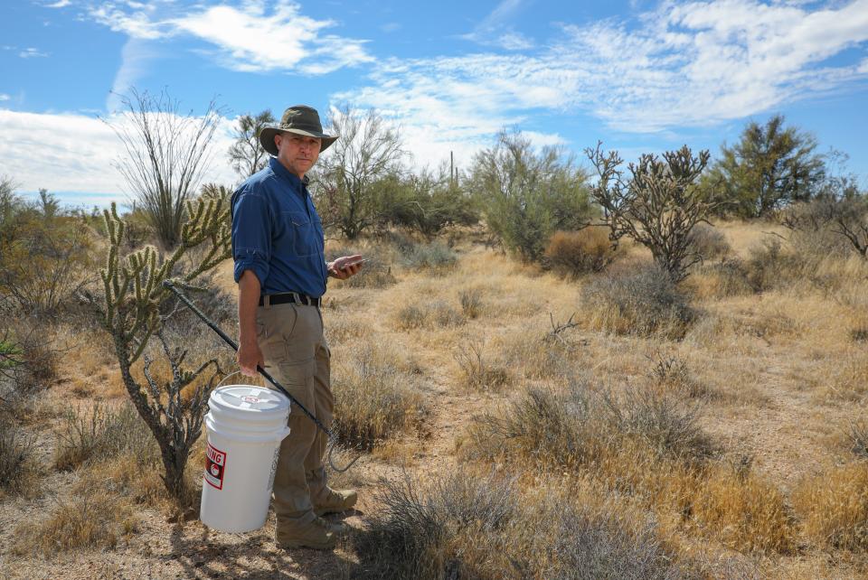 Bryan Hughes, owner and president of Rattlesnake Solutions, ventures into the desert to find the "perfect spot" to release a captured western diamondback rattlesnake.