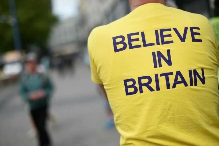 A campaigner wears a T-shirt with the slogan "Believe In Britain" as he attends an UKIP pro-Brexit campaign event, ahead of the forthcoming referendum, in Birmingham on May 31, 2016