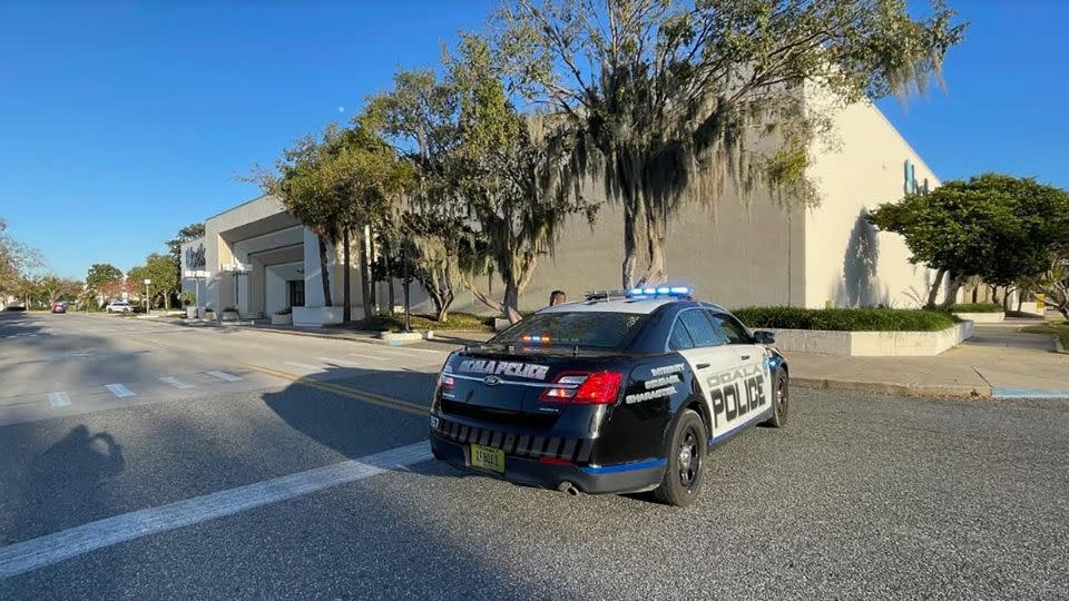 An Ocala Police Department vehicle is seen outside the Paddock Mall on Saturday. - Alan Youngblood for the Star-Ban//USA Today Network/Reuters