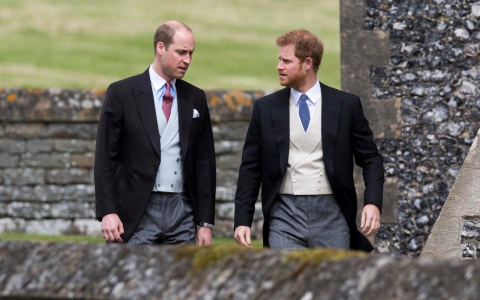 Will and Harry at Pippa's wedding - Credit:  Arthur Edwards