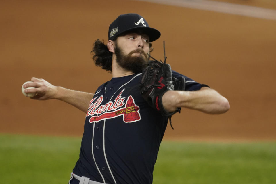 Atlanta Braves starting pitcher Ian Anderson throws against the Los Angeles Dodgers during the first inning in Game 7 of a baseball National League Championship Series Sunday, Oct. 18, 2020, in Arlington, Texas. (AP Photo/Tony Gutierrez)