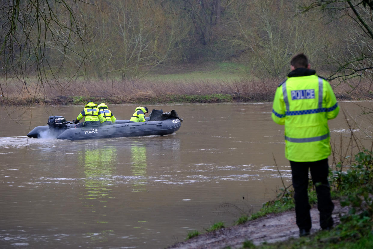 Specialist police underwater search teams on the river Trent. (SWNS)