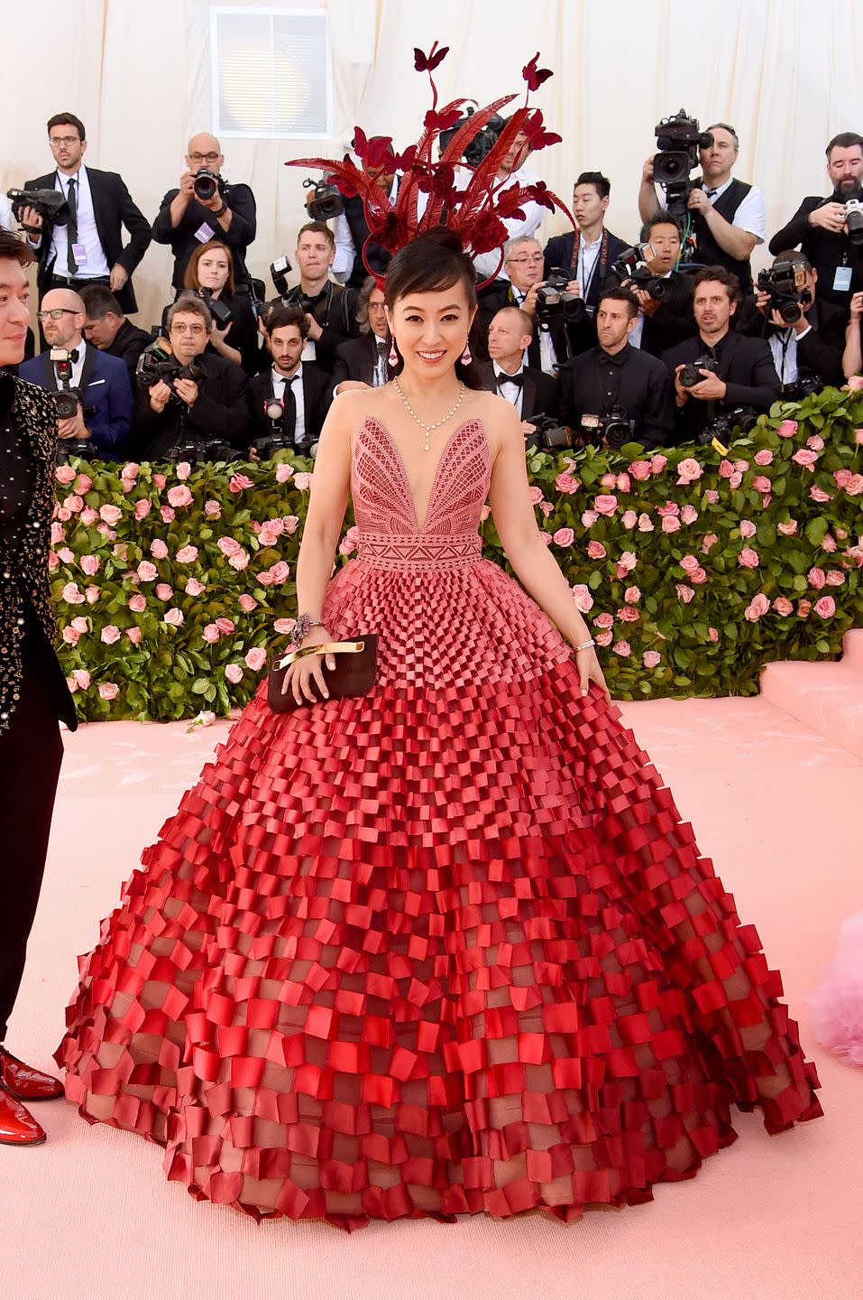 senreve designer coral chung in a pink and red checkerboard gown at the 2019 met gala