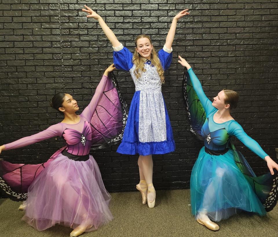 From left, Sofia Ali, portraying a butterfly, Eden Holmes, portraying Alice, and Emma Pittman, portraying a butterfly prepare for the upcoming production of Lone Star Ballet's "Alice in Wonderland." The production will be held April 14-15 at the Globe-News Center for the Performing Arts.