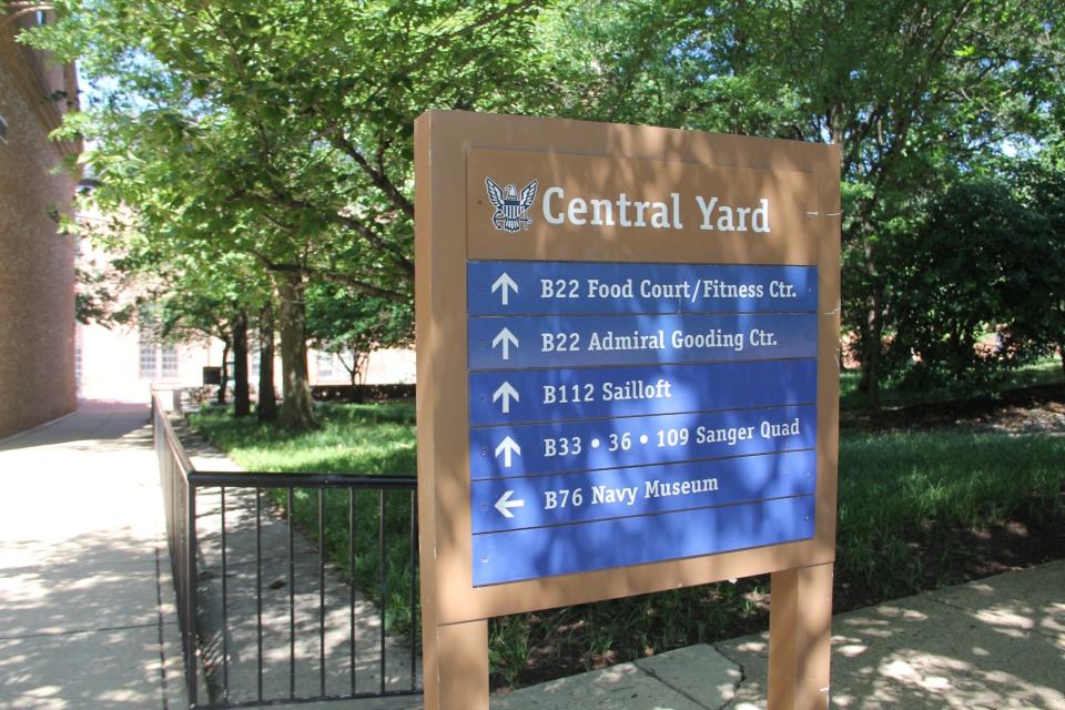 A sign on the military base that houses the National Museum of the United States Navy.