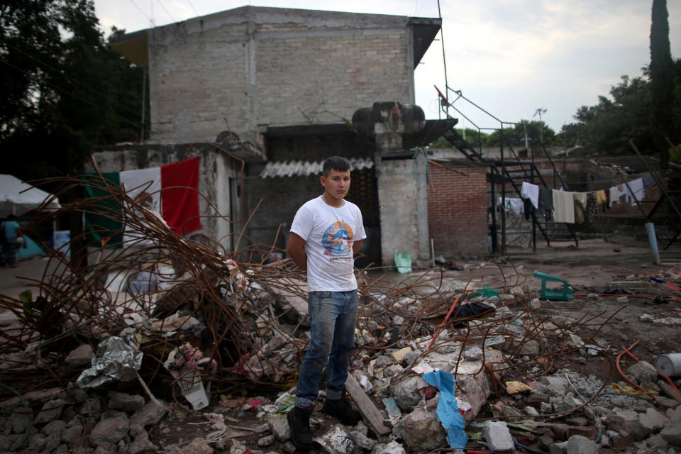 <p>Rene Contreras, 20, a student, poses for a portrait on the rubble of his house after an earthquake in Jojutla de Juarez, Mexico, September 29, 2017. The house was badly damaged. “Now I live with my brother. Tomorrow a good-hearted person will build for me an emergency house. I will fight to get ahead,” Contreras said. (Photo: Edgard Garrido/Reuters) </p>