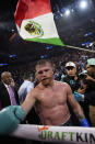 Canelo Alvarez celebrates after defeating Jaime Munguia in a super middleweight title fight Saturday, May 4, 2024, in Las Vegas. (AP Photo/John Locher)