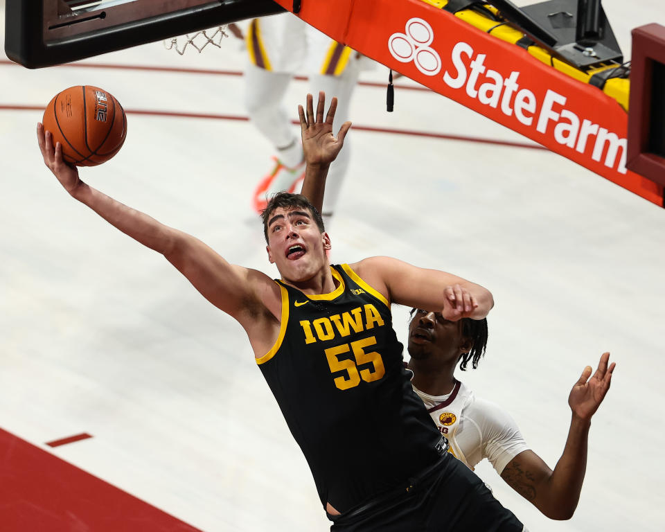 Dec 25, 2020; Minneapolis, Minnesota, USA; Iowa Hawkeyes center Luka Garza (55) shoots the ball during the first half against the Minnesota Gophers at Williams Arena. Mandatory Credit: Harrison Barden-USA TODAY Sports