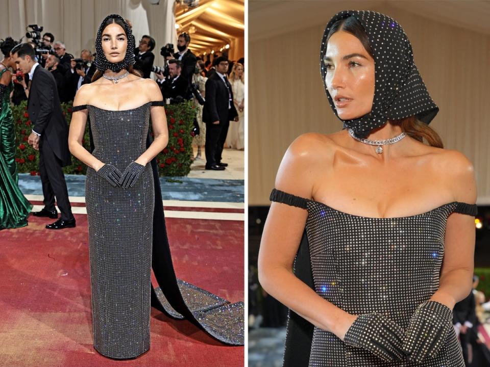 Lily Aldridge wearing black crystal dress and scarf at the 2022 met gala