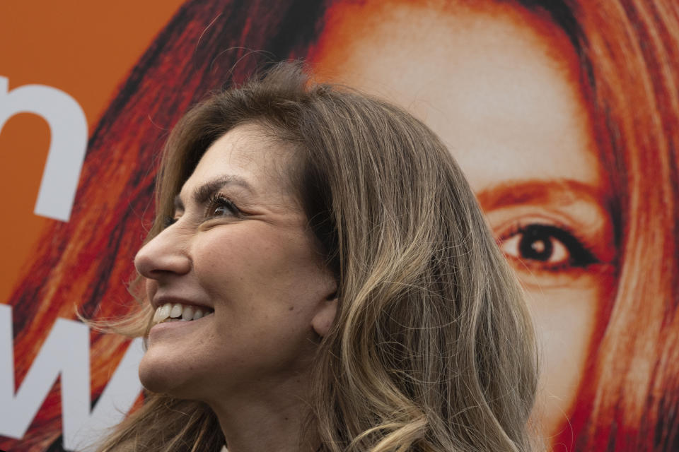 Dilan Yesilgoz, leader of the center-right Liberal Party talks to voters during an election campaign in Hilversum, Netherlands, Saturday, Nov. 11, 2023. (AP Photo/Peter Dejong)