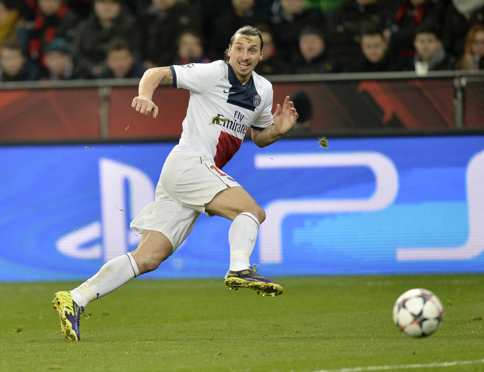 PSG's Zlatan Ibrahimovic runs for the ball during a Champions League round of the last 16 first leg soccer match between Bayer Leverkusen and Paris Saint-Germain in Leverkusen, Germany, Tuesday Feb. 18, 2014. (AP Photo/Martin Meissner)