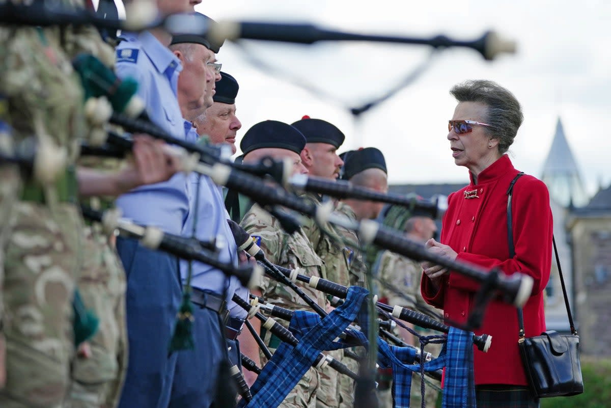 The Princess Royal meets piper training cadets before the start of the rehearsal for this year’s Tattoo (Jane Barlow/PA) (PA Wire)