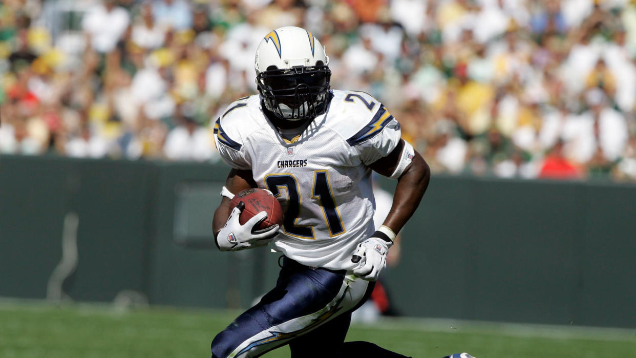 Mandatory Credit: Photo by Morry Gash/AP/Shutterstock (6030944aa)LaDainian Tomlinson San Diego Chargers LaDainian Tomlinson (21) runs in the open field against the Green Bay Packers during the second half of an NFL football game, in Green Bay, WisChargers Packers Football, Green Bay, USA.