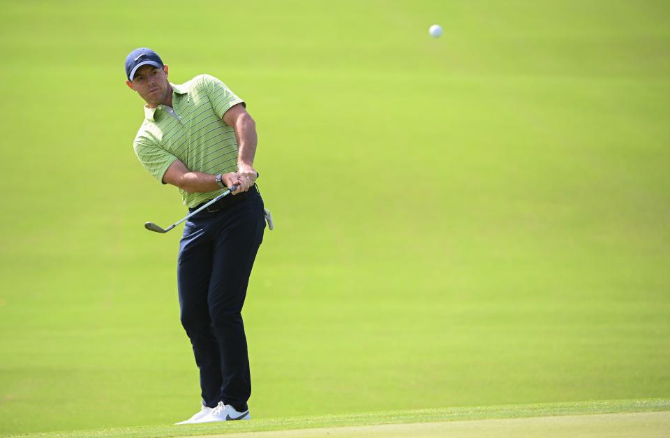 Rory McIlroy plays his shot on the 16th green during Thursday's first round of the PGA Championship in Tulsa, Oklahoma. His 65 topped the leaderboard.