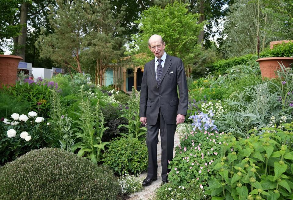 <p>Prince Edward visited The Chelsea Flower Show, posing for a photo amongst the greenery.</p>