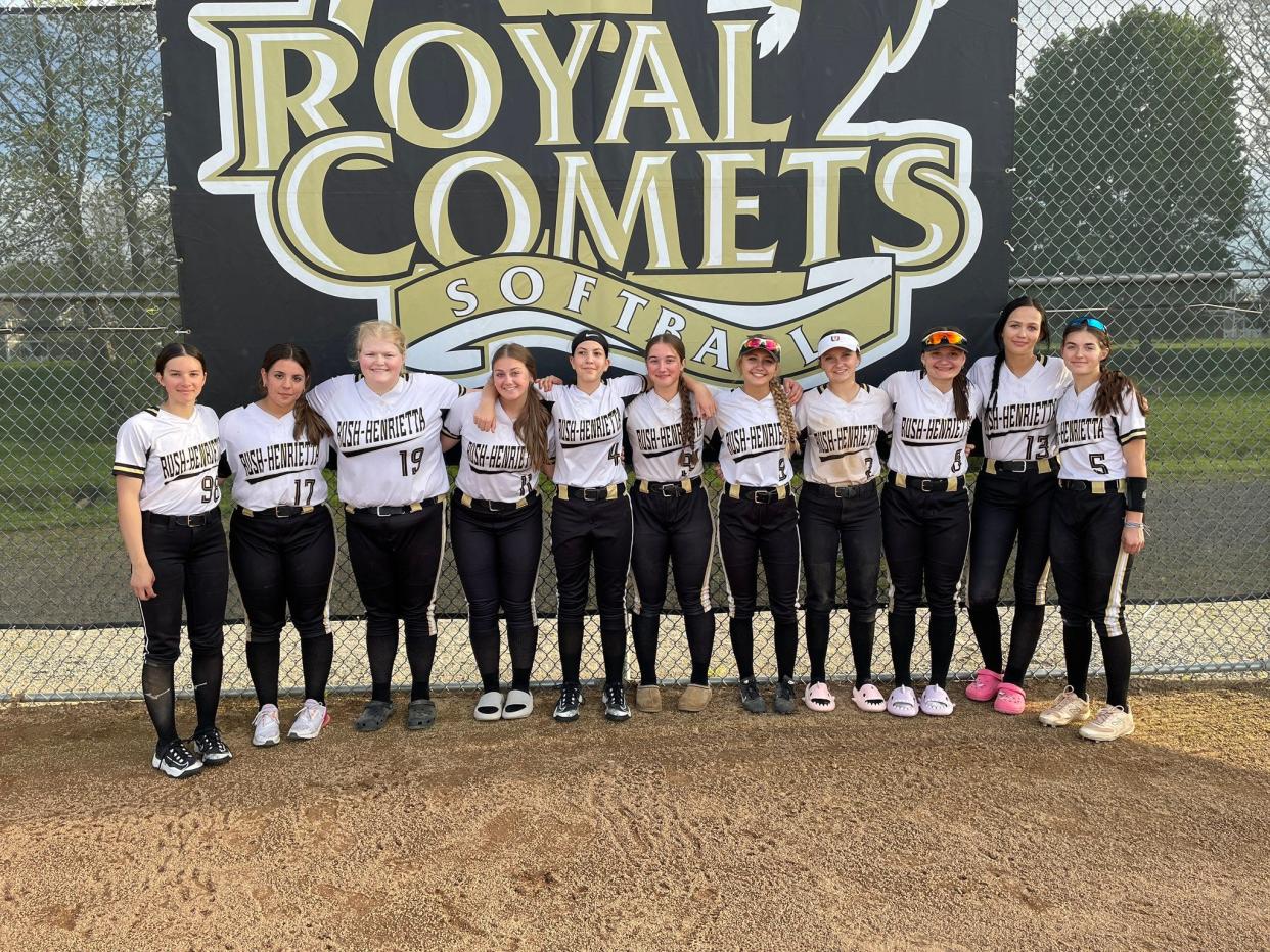 Rush-Henrietta's softball team after a 3-2 win over Penfield in eight innings Monday, May 6, 2024 in Henrietta.