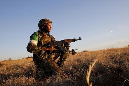 Mozambican soldiers join exercises as part of the African Union's African Standby Force (ASF) at the South Africa National Defence Force's Lohatla training area October 27, 2015. REUTERS/Mike Hutchings