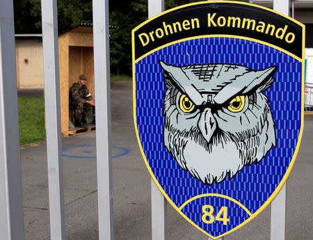 FILE PHOTO: The sign of the Drone Command (Drohnen Kommando) of the Swiss air force is pictured on a gate at the airbase in the central Swiss town of Emmen September 20, 2012. REUTERS/Arnd Wiegmann/File Photo