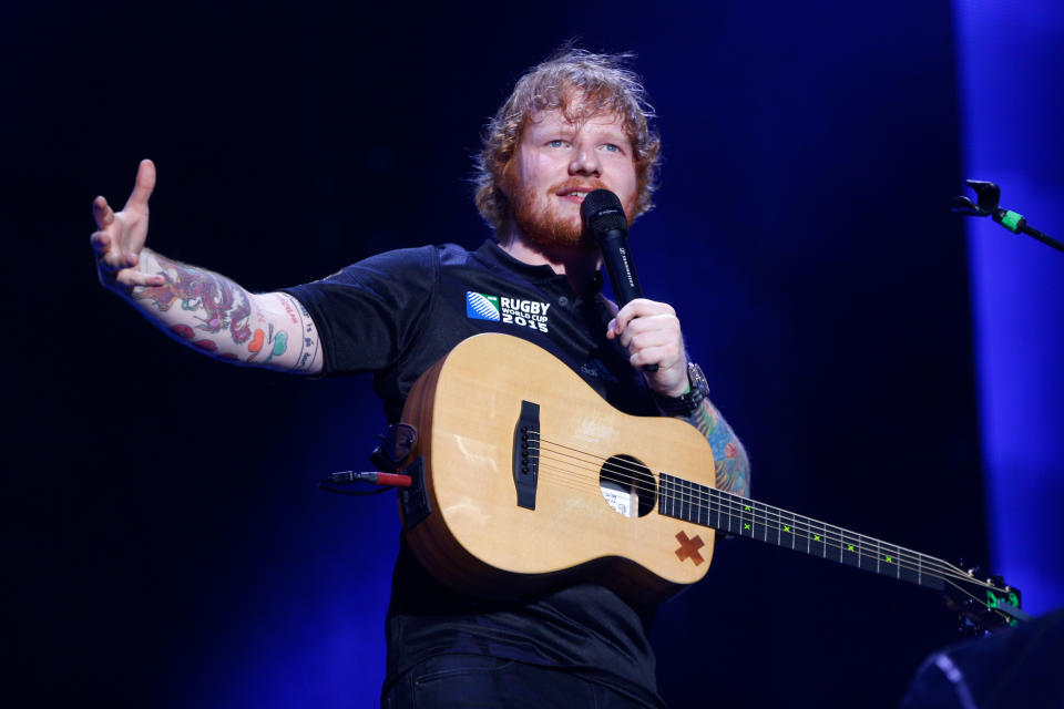 It appears as if Ed Sheeran is wearing a wedding ring and WE. HAVE. QUESTIONS.