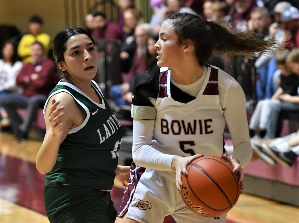 Bowie's Neely Price looks to pass against Breckenridge's Camila Palacios during the Bi-District playoffs at MSU on Monday, February 13, 2023.