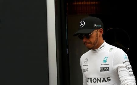 Formula One - F1 - Test session - Barcelona-Catalunya racetrack in Montmelo, Spain - 28/02/17. Lewis Hamilton of Mercedes walks by the paddock. REUTERS/Albert Gea