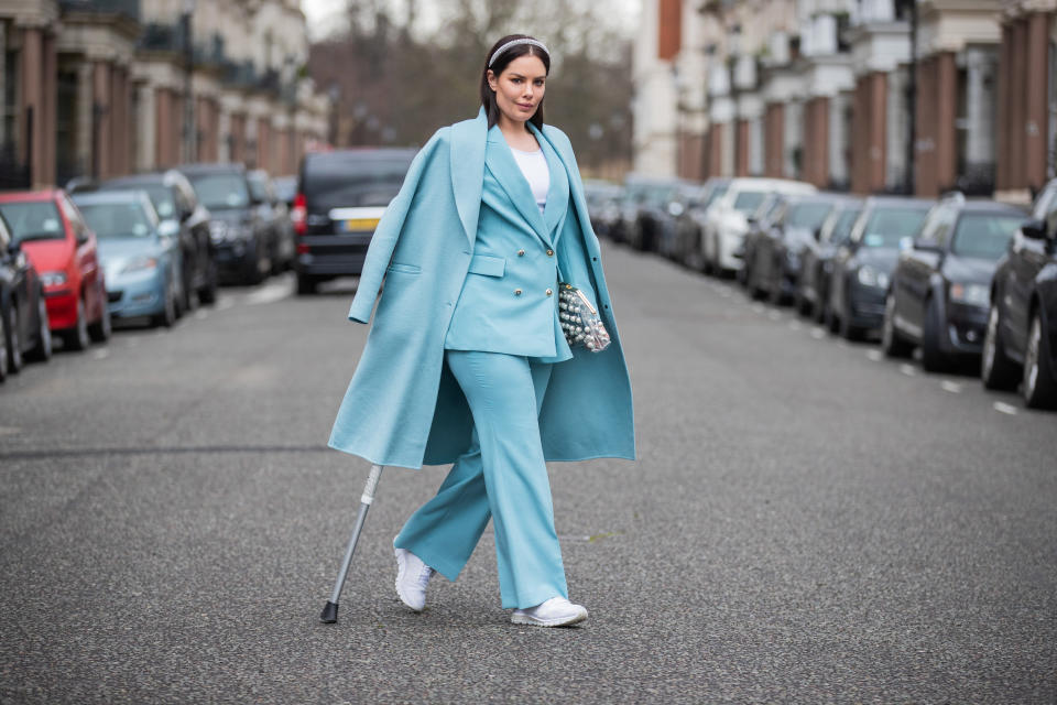 LONDON, ENGLAND - MARCH 04: Beau Dunn is seen wearing turquoise coat, blazer and pants, see through bag on March 04, 2020 in London, England. (Photo by Christian Vierig/Getty Images)