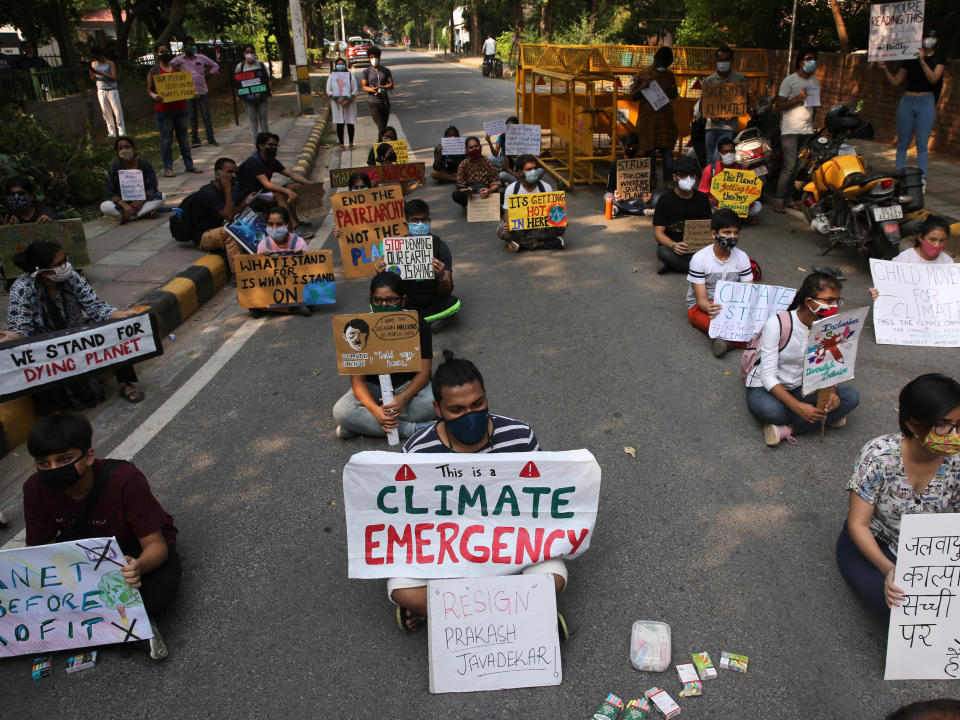 Activists from various environmental groups take part in a protest against climate change in New Delhi, India, 25 September 2020EPA