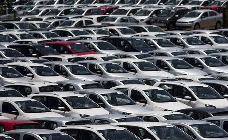 New cars are parked at a stock area of the Volkswagen German automaker plant in Sao Jose dos Campos near Sao Paulo January 7, 2015. REUTERS/Roosevelt Cassio