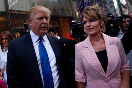 Sarah Palin, who is being considered for VA Secretary, meets with Donald Trump. [Image by Andrew Burton/Getty Images]