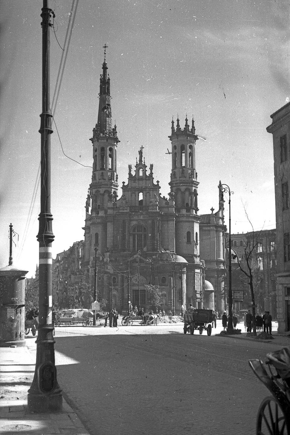 In this 1940s photo, the ruins of Marszalkowska street, leading into Savior Square are shown after World War II in Warsaw, Poland. One of the spires of the damaged Church of the Holiest Savior is seen in the background. Rebuilt in the 1950s, Savior Square, sometimes called Hipster Square, has become one of Warsaw’s trendiest places after political and economic reform and attracts tourists, students and professionals alike. (AP Photo/Warsaw Rising Museum)