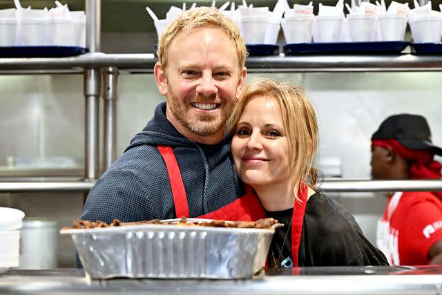 <p>Rob Latour/Shutterstock </p> Ian Ziering and Emma Caulfield at Los Angeles Mission to Serve Up Easter Meals for the Skids Row Community