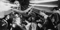 <p>Bright lights and crowded dance floors were the norm at disco clubs in the '70s. Here, teenagers hit the dance floor in 1974. </p>