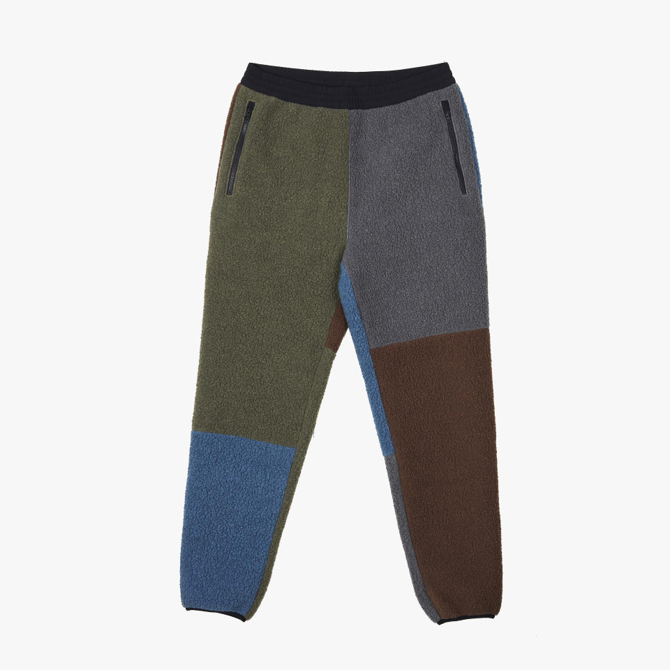 This image provided by SNS show the patchwork Polartec fleece set for Sneakers N Stuff. The color palette screams fall in moss, brown and earthy blue. (SNS via AP)