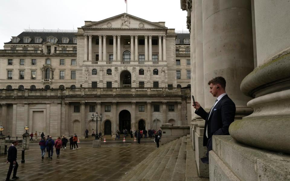 The Bank of England's next interest rate decision will be revealed at midday - AP Photo/Kin Cheung