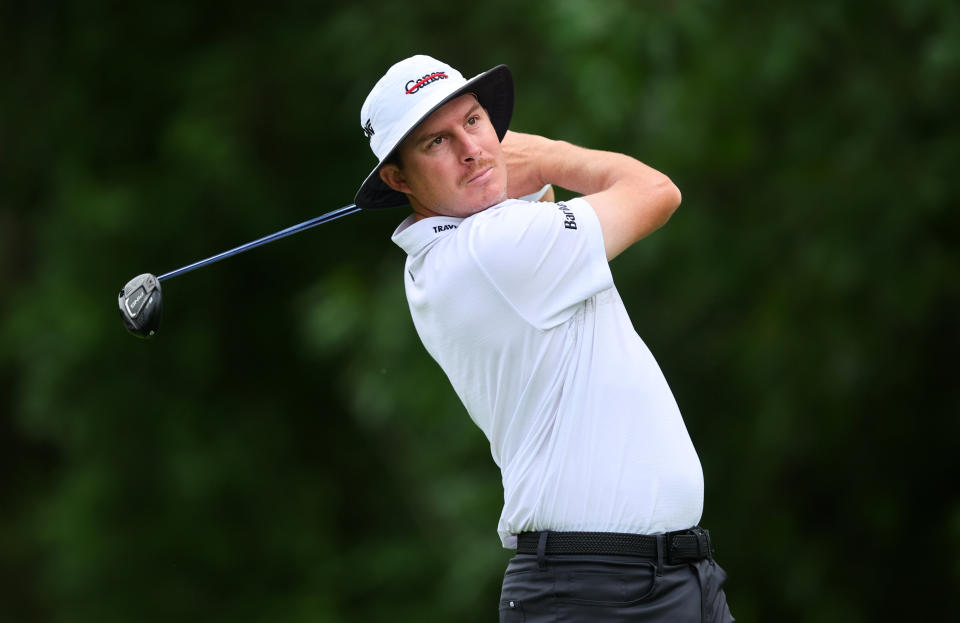 joel dahmen hits a fairway wood