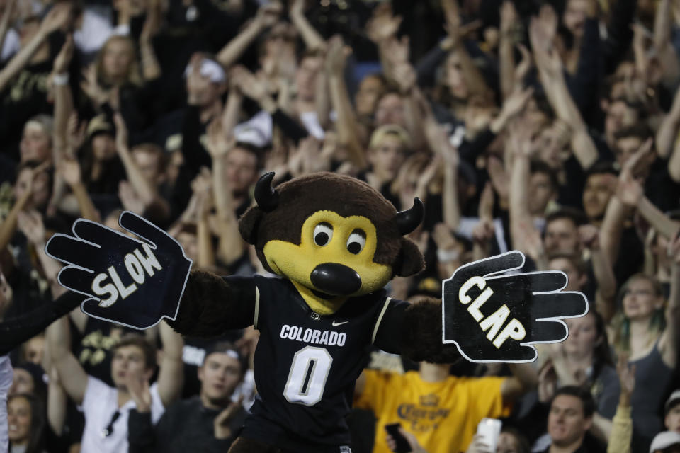 Colorado Buffaloes mascot Chip leads crowd in cheer in the first half of an NCAA college football game Saturday, Oct. 7, 2017, in Boulder, Colo. (AP Photo/David Zalubowski)