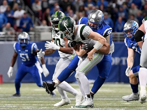 Former Peoria High School defensive lineman LaCale London sacks the quarterback in an XFL game for the St. Louis BattleHawks in 2023.