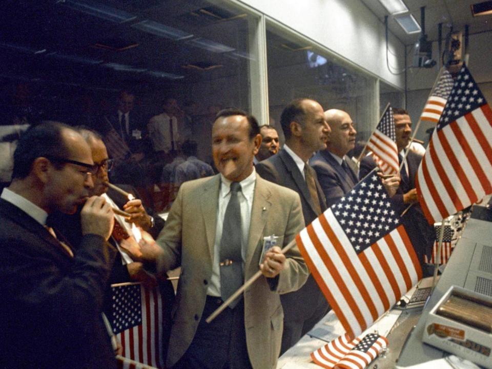 Nasa officials celebrate the successful conclusion of the Apollo 11 lunar landing mission (Alamy)