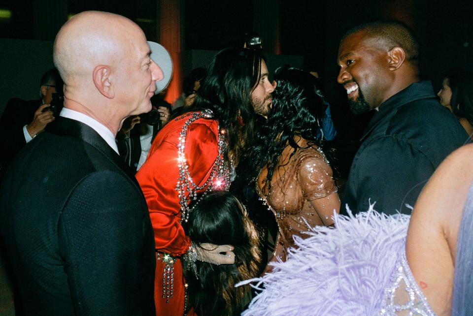 2019 - Jeff Bezos and Kanye West admire each other as Jared Leto and Kim Kardashian kiss hello betwen them.