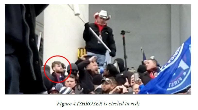 An Aug. 19, 2021, criminal complaint and arrest affidavit filed in U.S. District Court in Washington D.C. includes screen grabs from video footage that FBI investigators said shows Infowars host Owen Shroyer in restricted areas of the U.S. Capitol grounds on Jan. 6, the day of the deadly Capitol riots. Shroyer is charged with knowingly entering or remaining in a restricted area without lawful authority and engaging in violent entry and disorderly conduct.
