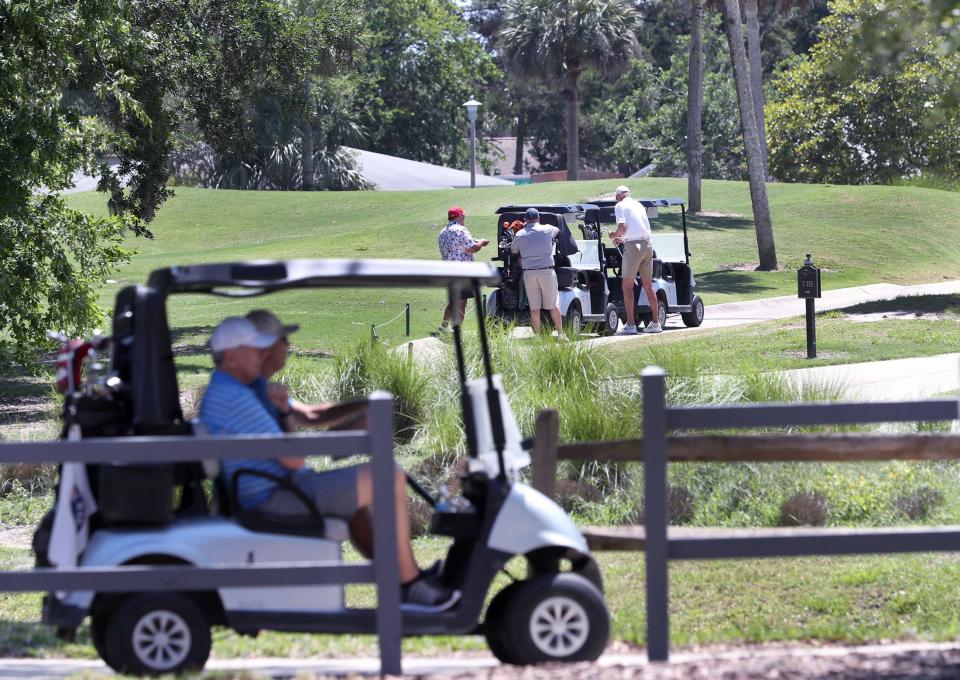 Golfers enjoy a afternoon at Palm Harbor Golf Club, Monday May 1, 2023 in Palm Coast.