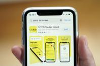 FILE PHOTO: A photo illustration shows the COVID Tracker Ireland app in Galway