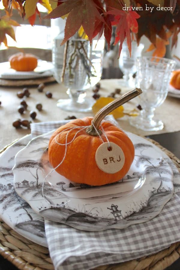 <p>Who says salt dough ornaments are only for Christmas? When tied to pumpkins, your favorite childhood craft makes delightful <a href="https://www.countryliving.com/entertaining/g1538/diy-place-cards/" rel="nofollow noopener" target="_blank" data-ylk="slk:Thanksgiving place cards;elm:context_link;itc:0;sec:content-canvas" class="link ">Thanksgiving place cards</a>.</p><p><strong>Get the tutorial at <a href="https://www.drivenbydecor.com/decorating-thanksgiving-table-breakfast-casserole-recipe/" rel="nofollow noopener" target="_blank" data-ylk="slk:Driven By Decor;elm:context_link;itc:0;sec:content-canvas" class="link ">Driven By Decor</a>.</strong><br></p>