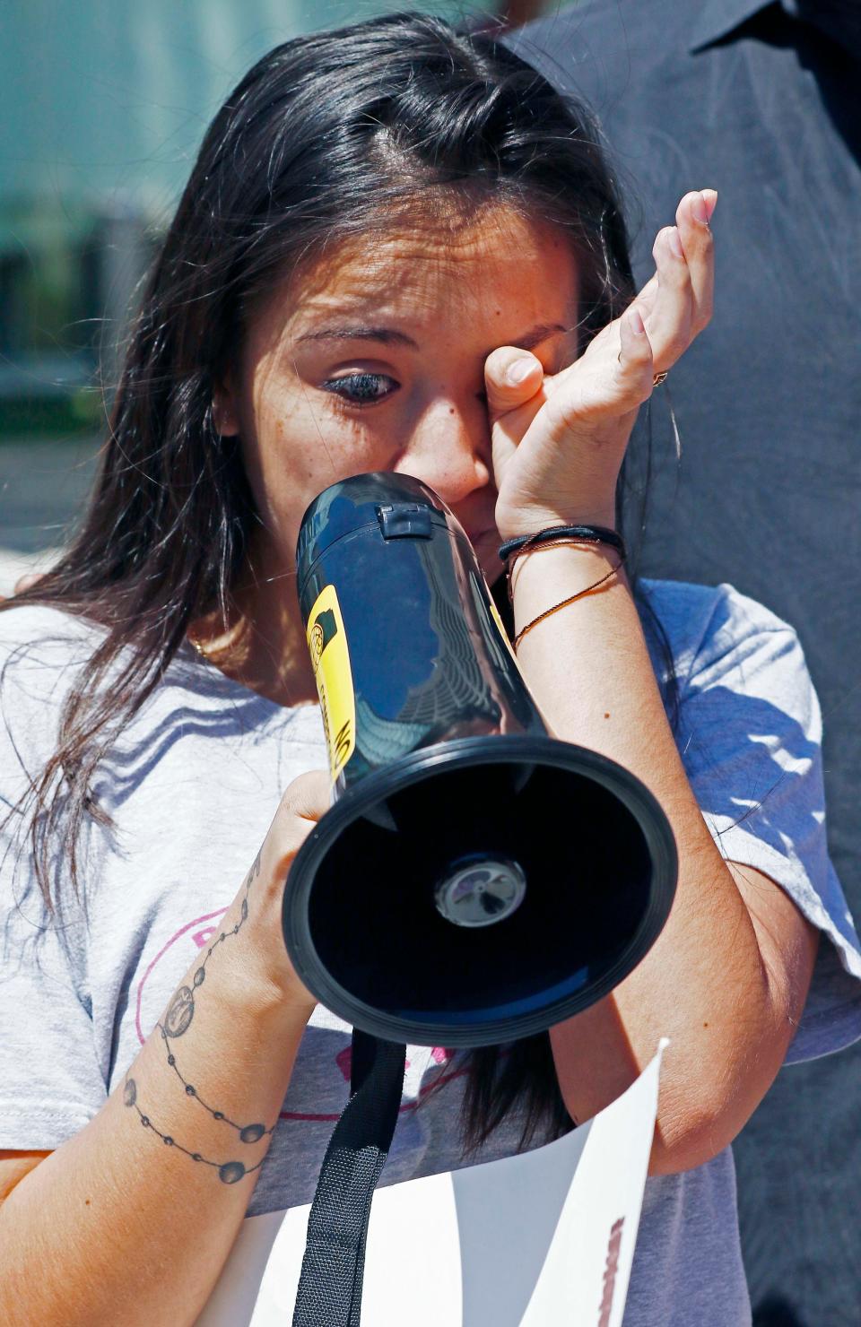Brenda Ramirez, 18, cries as she speaks in 2017 during a protest outside the federal building in Jackson, Miss., about the opportunities she receives via the DACA program