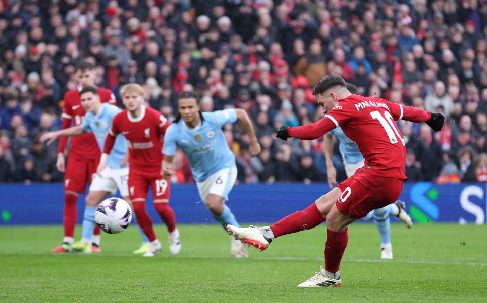 Alexis Mac Allister of Liverpool FC scores their first goal from the penalty spot