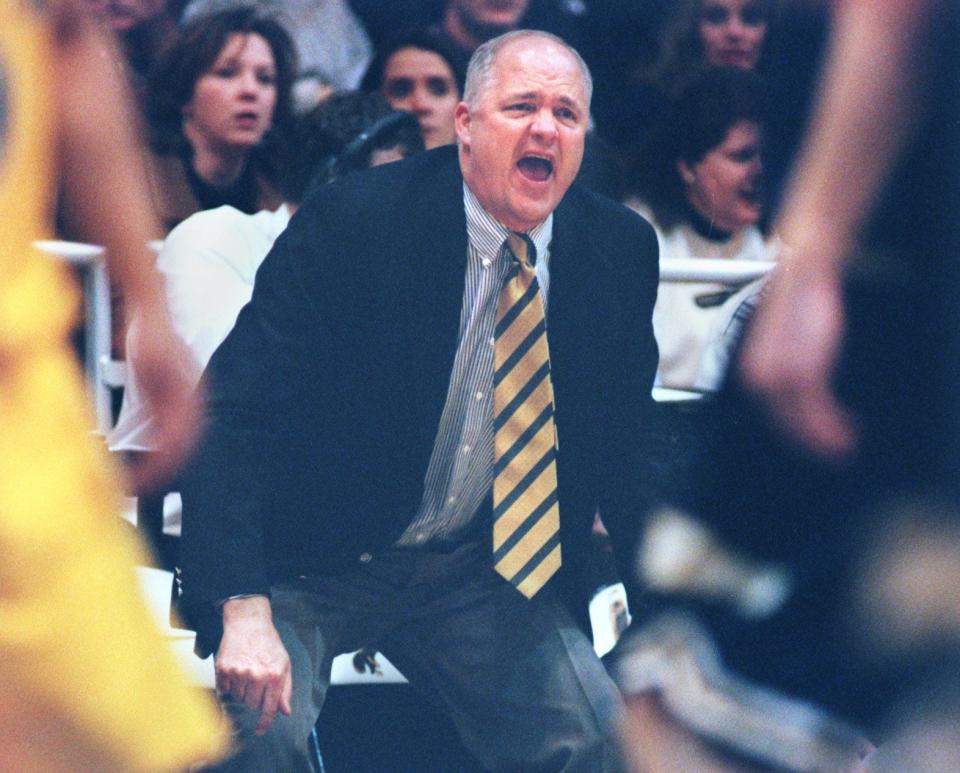 University of Akron coach Dan Hipsher yells to his team during a game at Kent State.