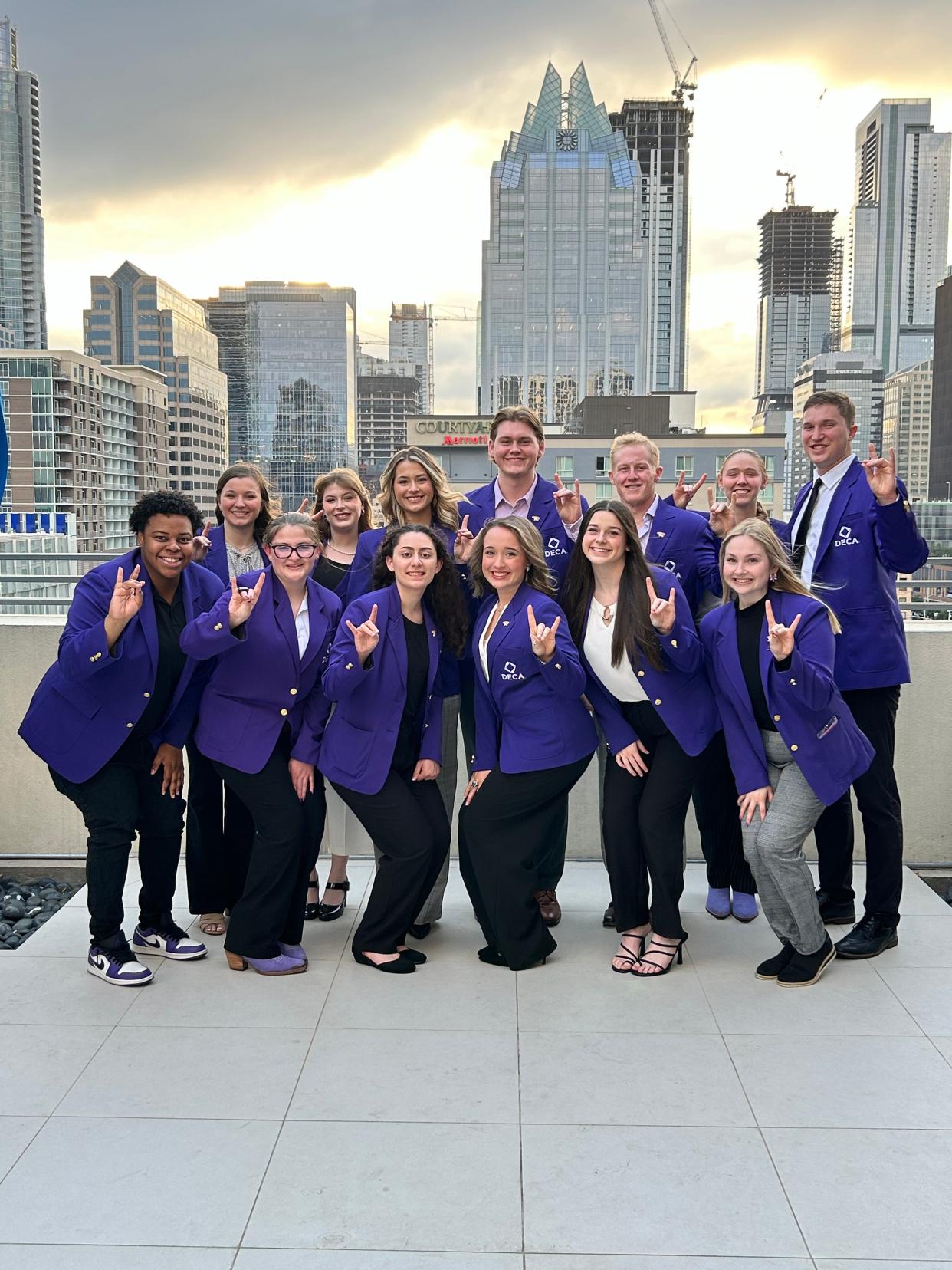 The Kansas Wesleyan University DECA team pose in Austin, Texas during the Collegiate DECA International Career Development Conference. More than half of the team members took home world championships from the event.