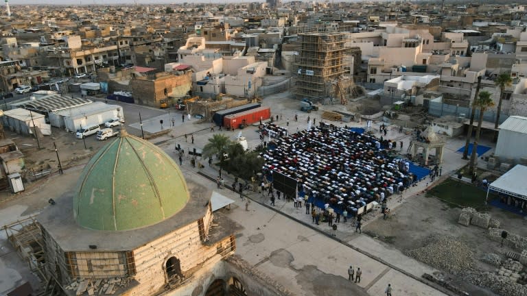 Muslims gathered to pray in the courtyard of the Al-Nuri mosque in Mosul during Eid al-Adha in 2022 (Zaid AL-OBEIDI)